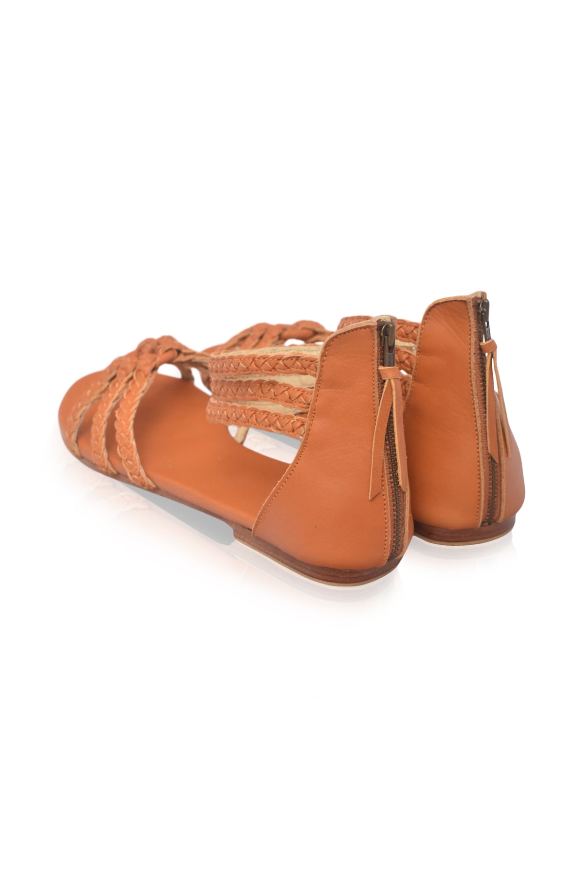 Brown braided leather sandals on a white background — handmade by Bali ELF
