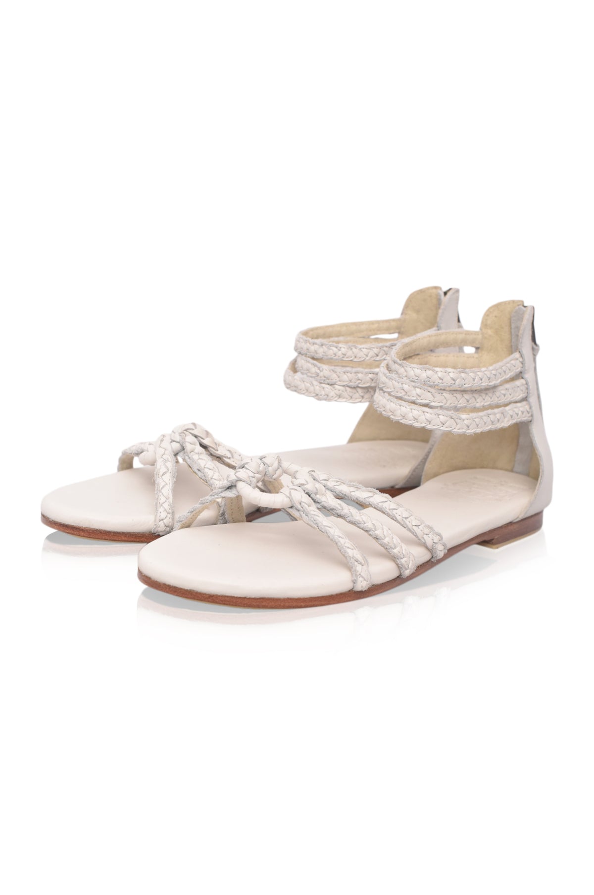 White braided leather sandals on a white background — handmade by Bali ELF