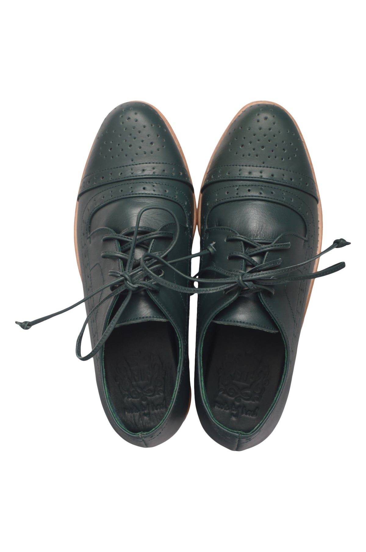 A pair of dark forest green leather oxford shoes with brogue detailing and matching laces, shown from a top-down view on a white background.