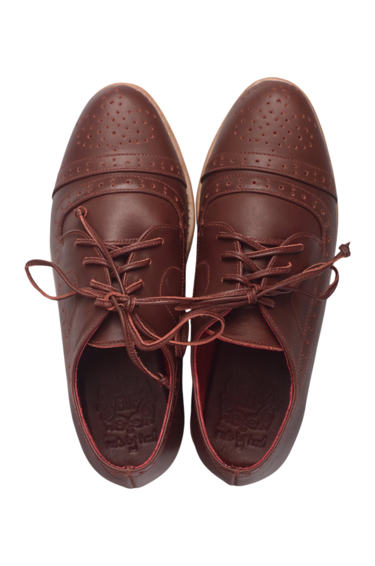 A pair of dark brown leather cap-toe oxford shoes with decorative perforations and matching laces, shown from a top-down view on a white background.