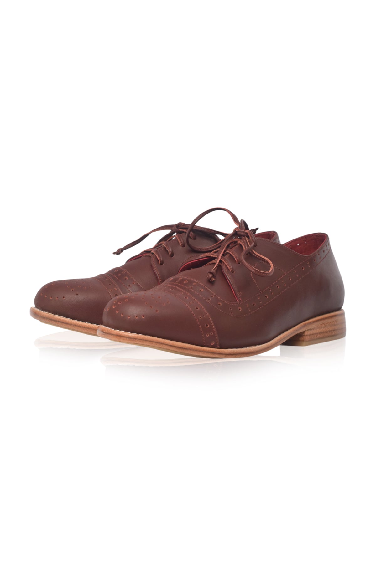 A pair of dark brown leather lace-up oxford shoes with brogue detailing, displayed on a clean white background.