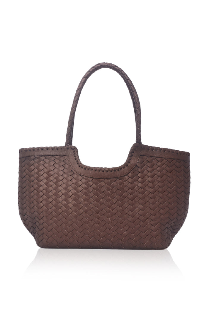 Brown woven handbag on a white background