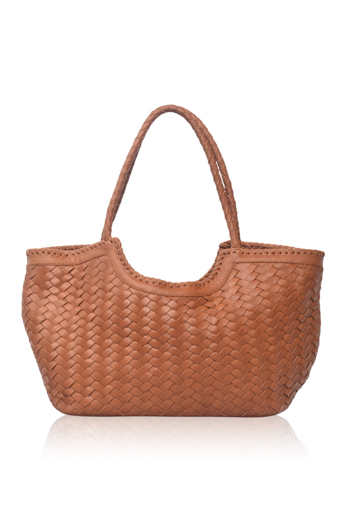 Brown woven handbag on a white background