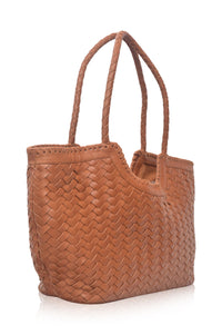 Brown woven tote bag on a white background