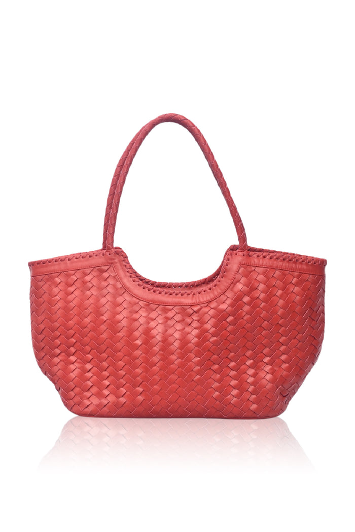 Red woven handbag on a white background