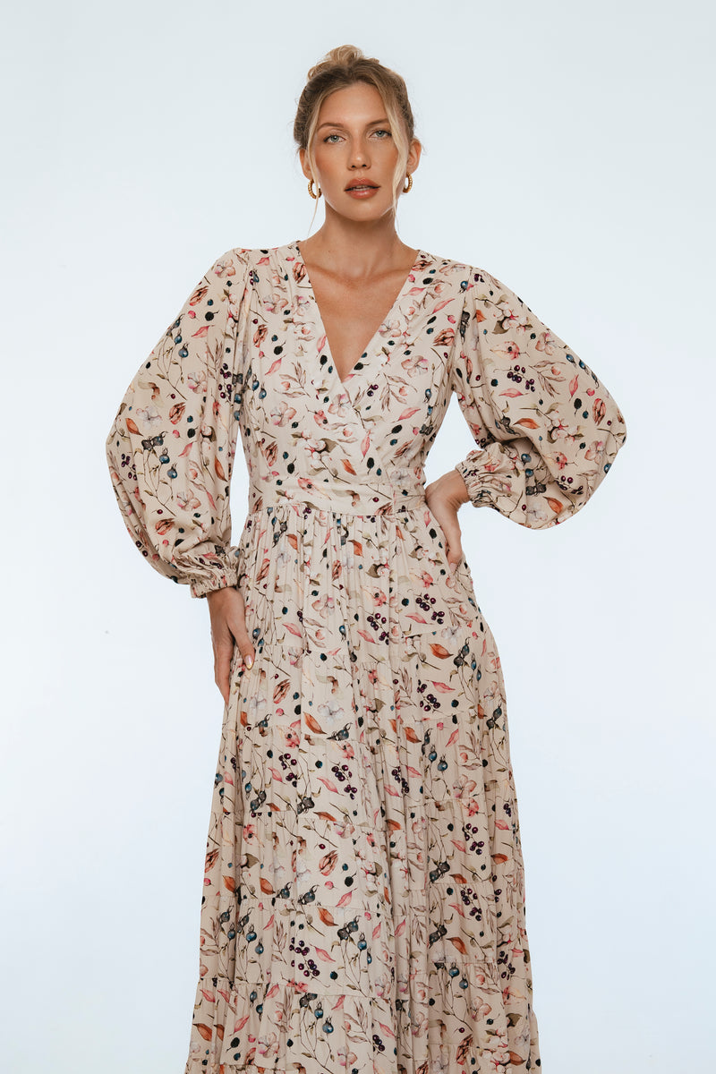 Woman wearing a floral dress on a white background