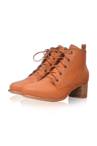 A pair of women's tan leather lace-up ankle boots with a stacked wood-look block heel, shown on a clean white background.