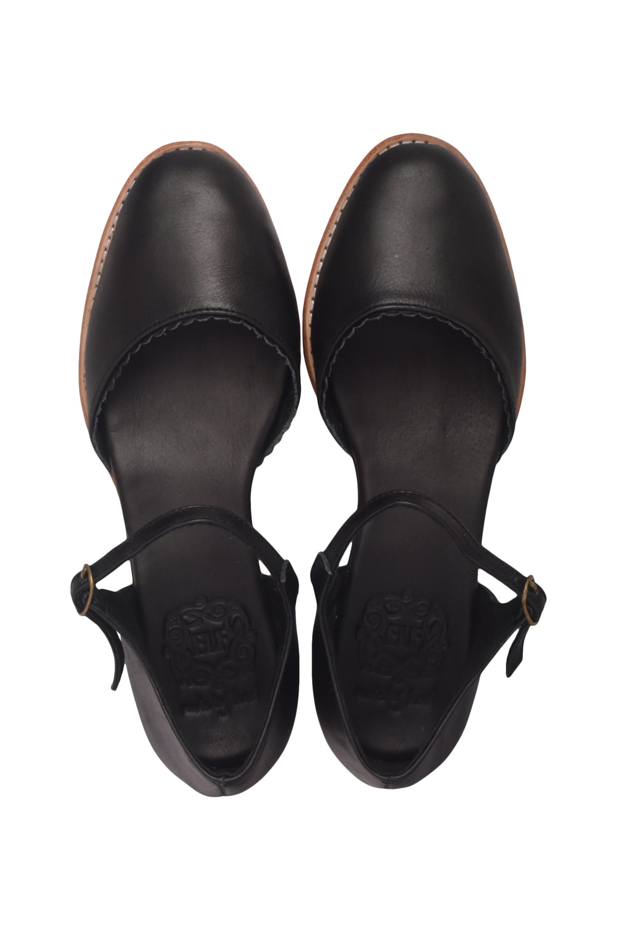 A pair of black leather Mary Jane-style sandals with ankle straps, shown from a top-down view on a white background.