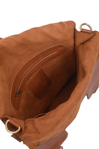 Brown leather bag with gold hardware on a white background