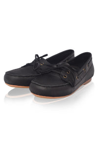 Pair of black leather shoes on a white background