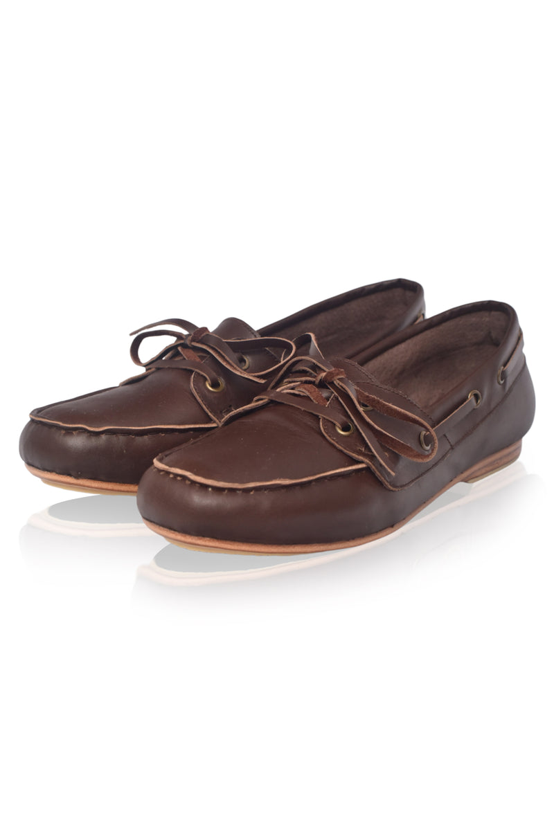 Pair of brown leather shoes on a white background