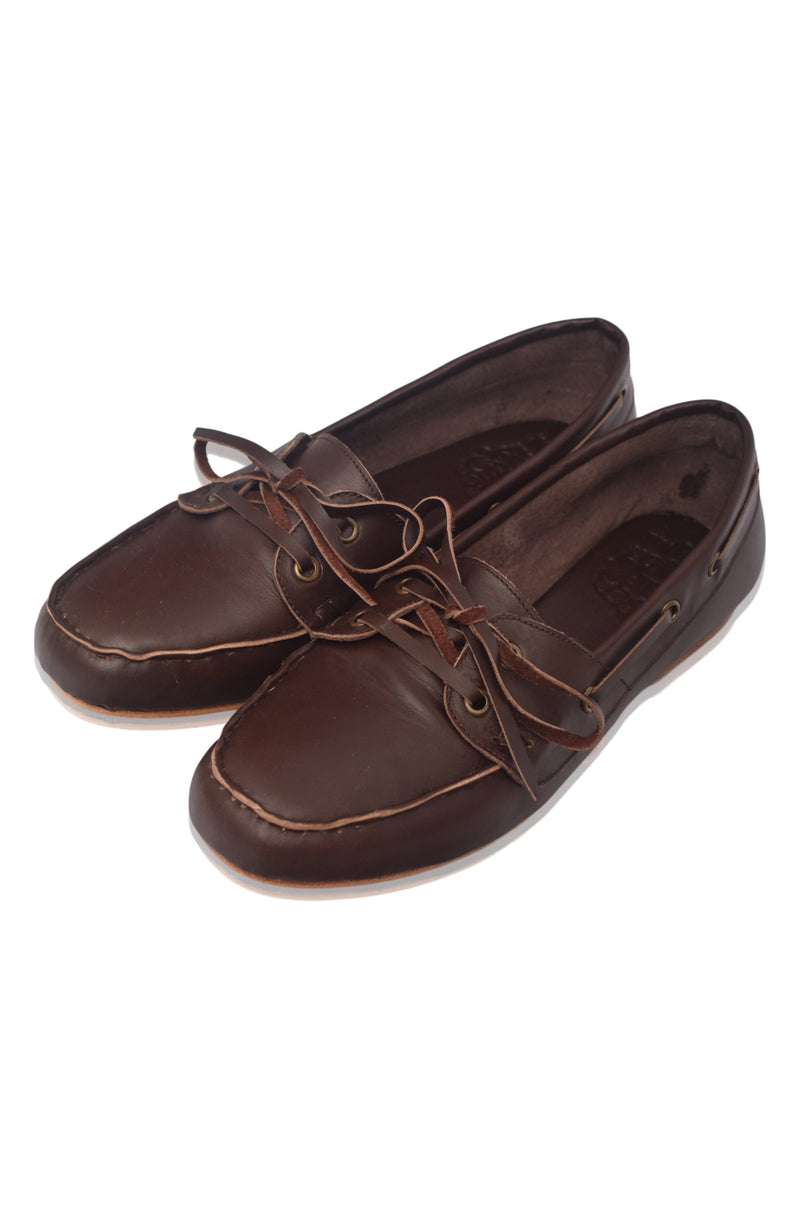 Pair of brown leather shoes on a white background