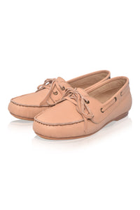 Pair of tan loafers on a white background