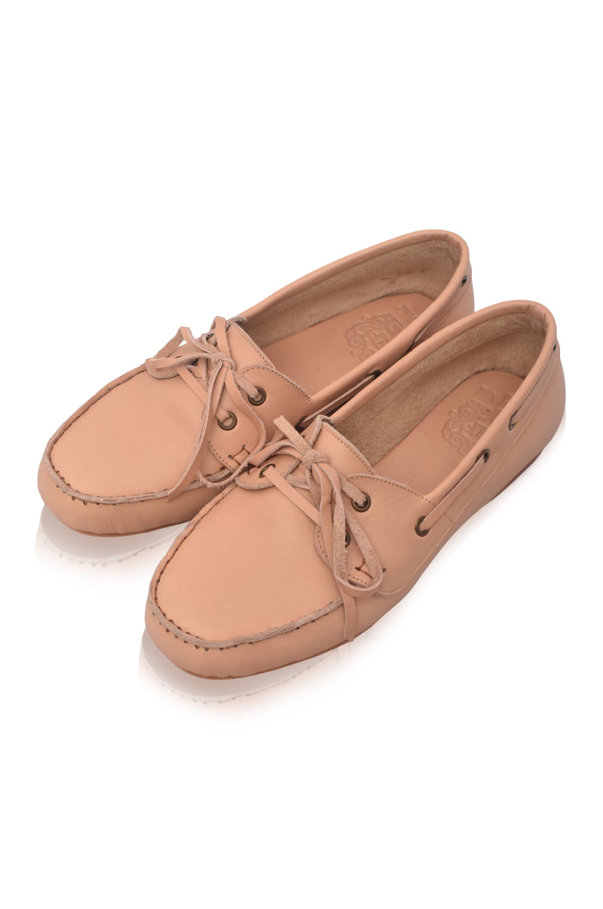 Pair of tan leather shoes on a white background