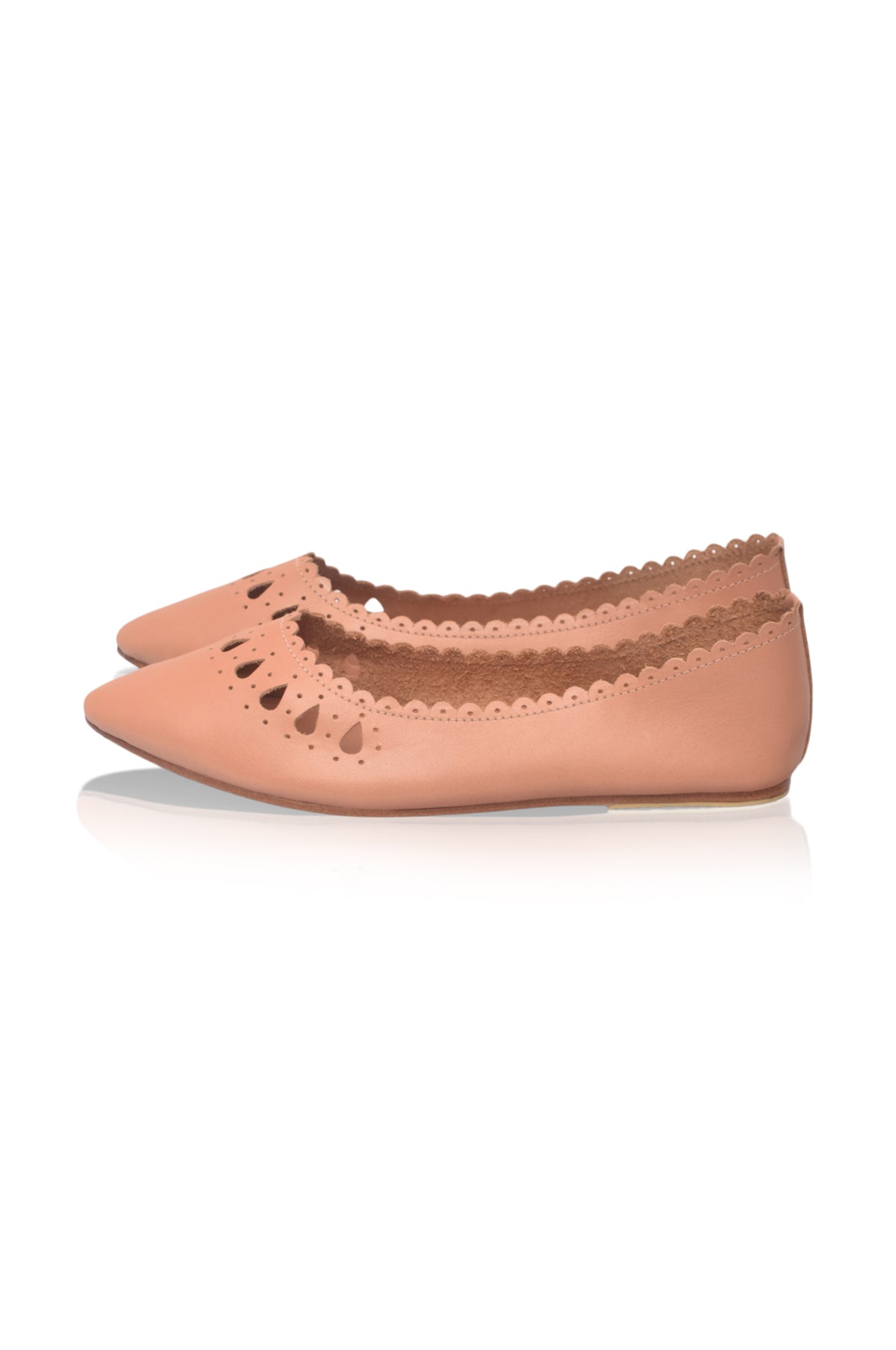 A pair of peach-colored pointed-toe flats with scalloped edges and decorative cutouts, shown from a side profile on a white background.