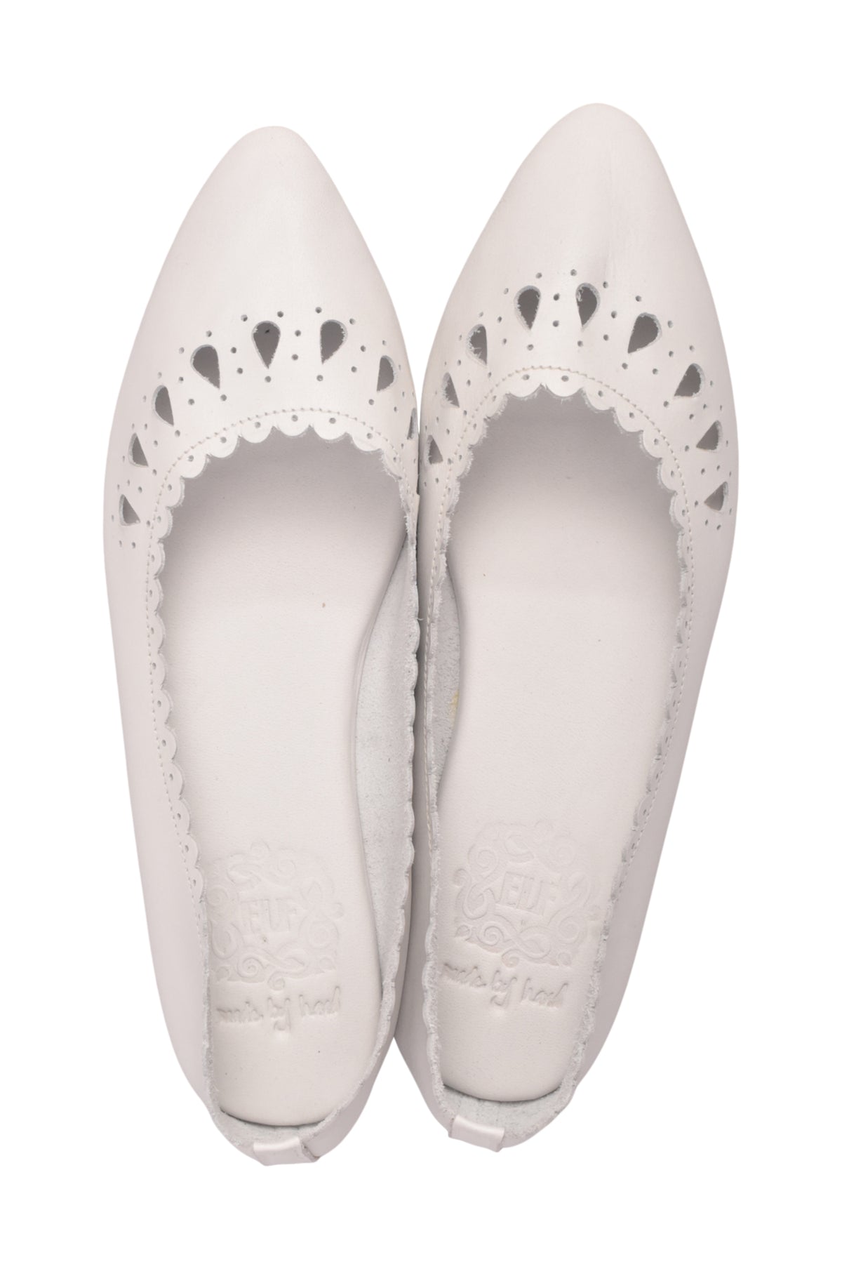 A pair of white pointed-toe flats with decorative scalloped cutout detailing across the vamp, shown from a top-down view on a white background.