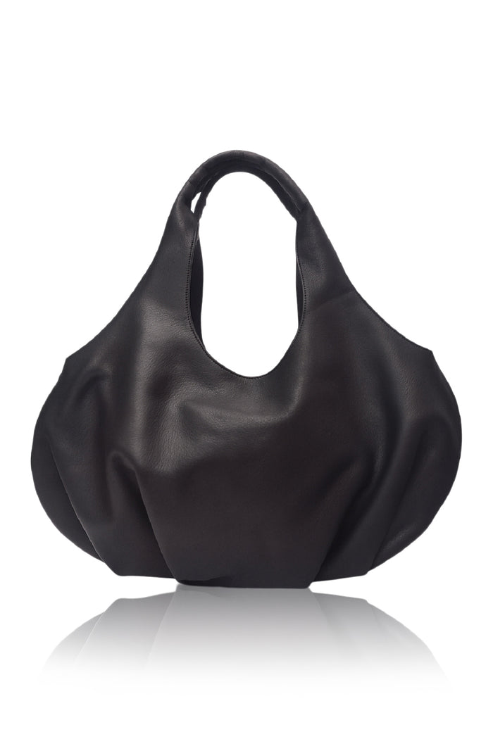 Black handbag on a white background