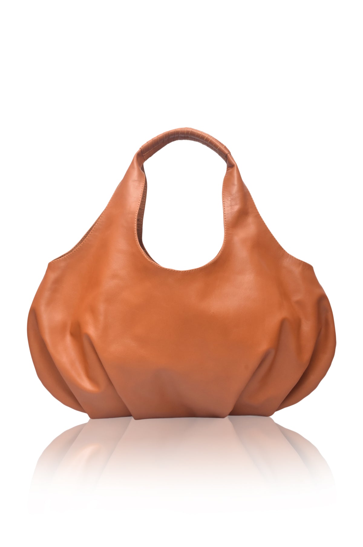 Brown leather handbag on a white background