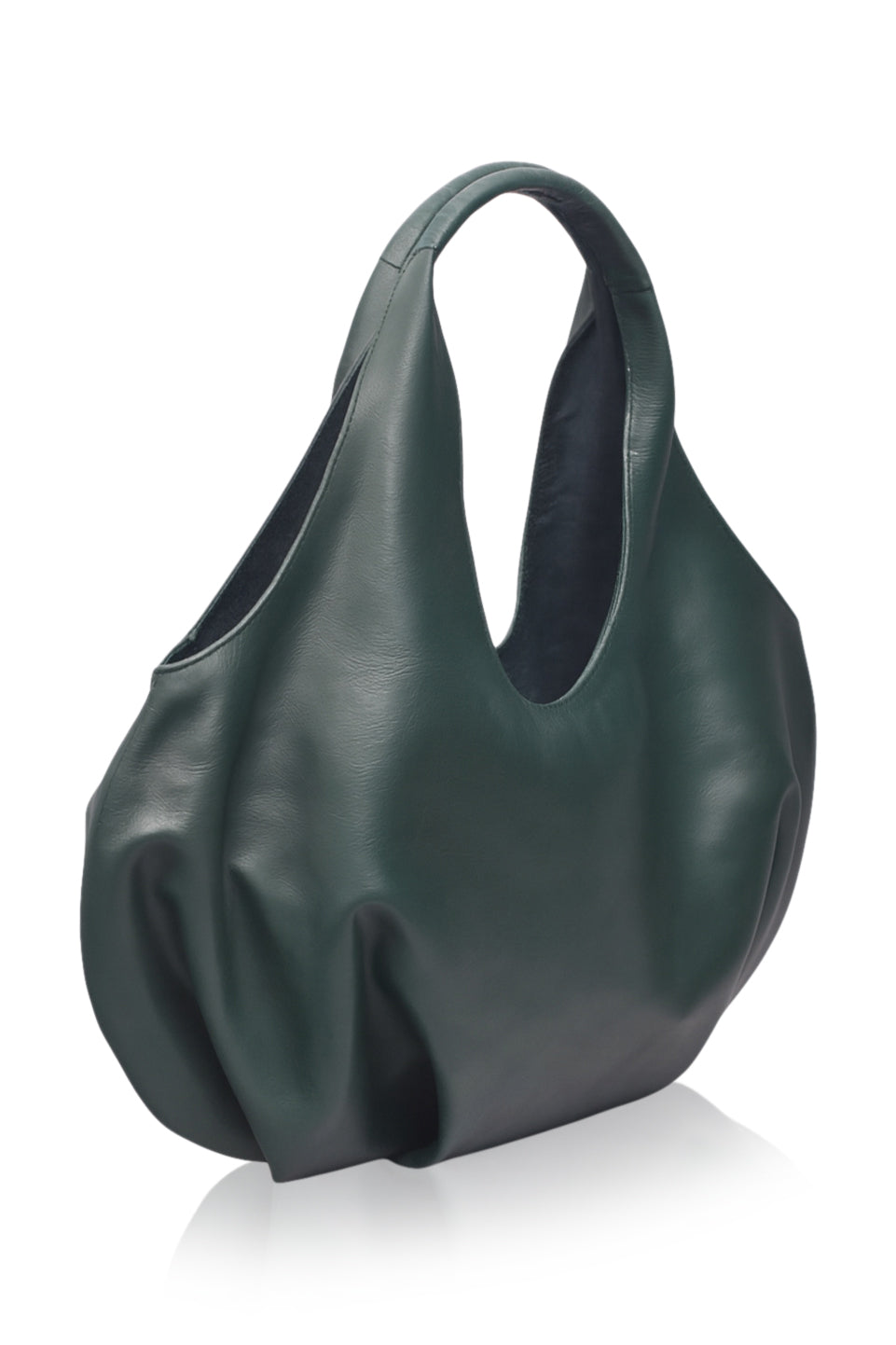 Green leather handbag on a white background