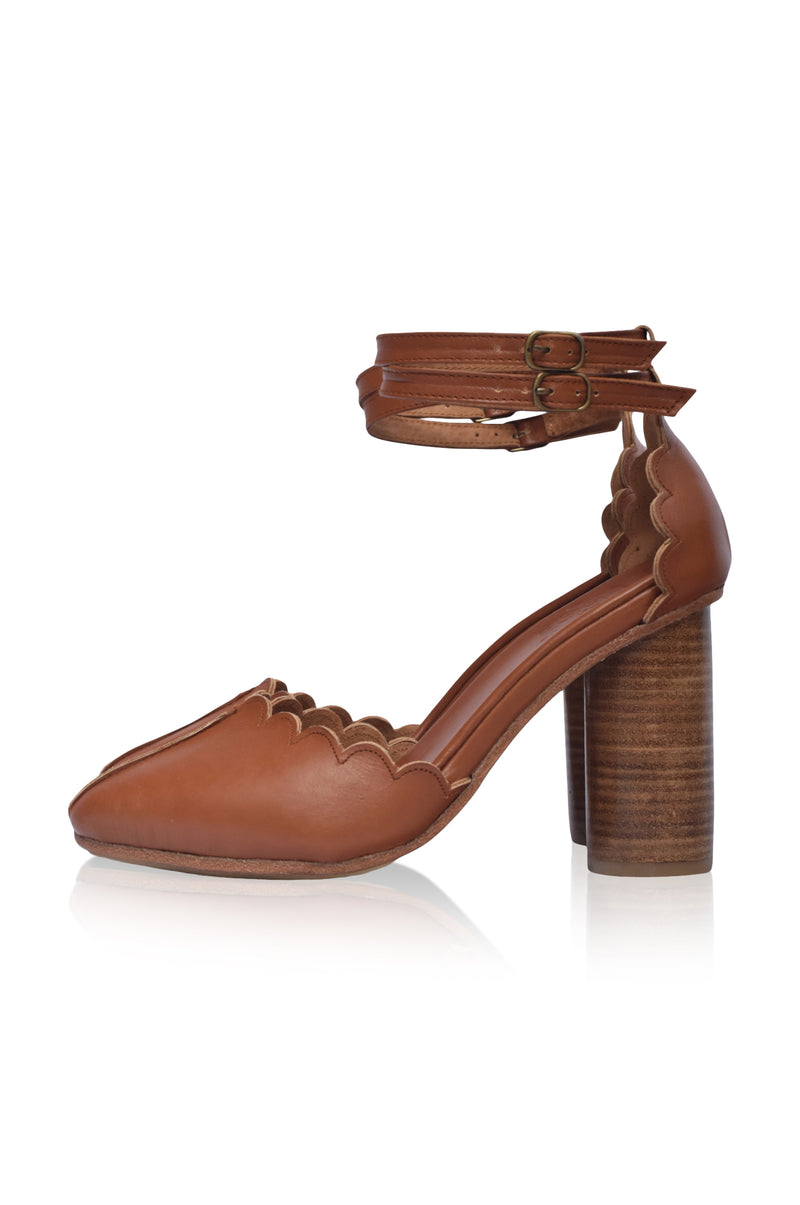 Monochromatic Magic with Statement Leather Heels