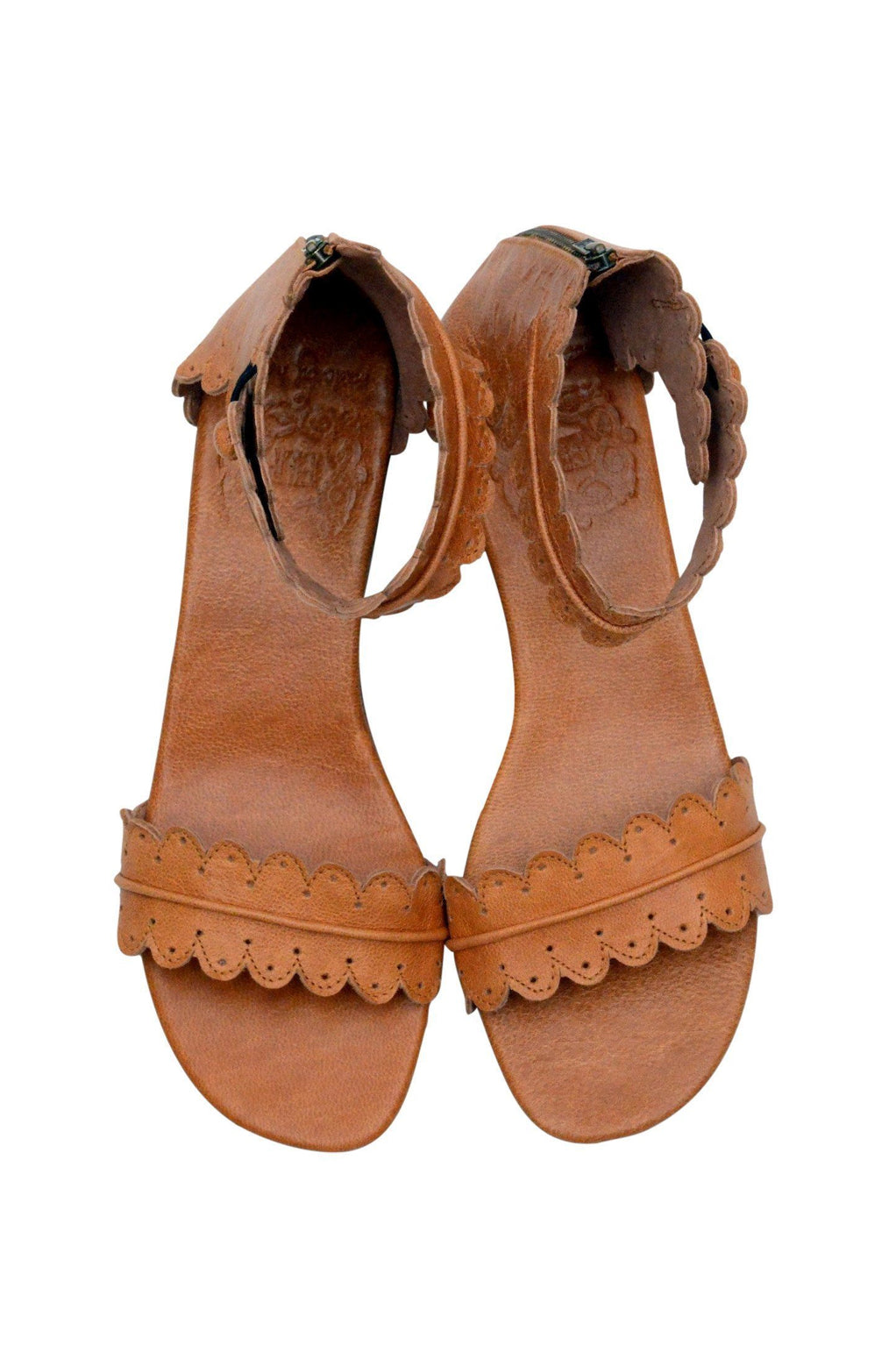 Leather wedge sandals with scallop edges and cut outs